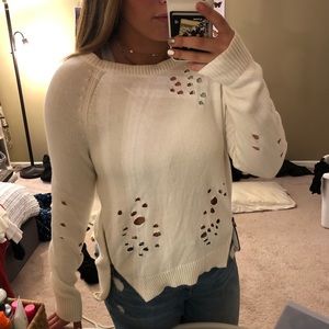 Distressed white sweater with zipper detail